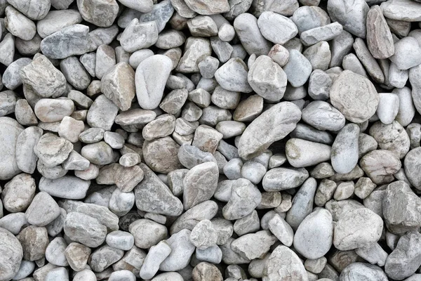 一堆堆鹅卵石的特写背景 — 图库照片
