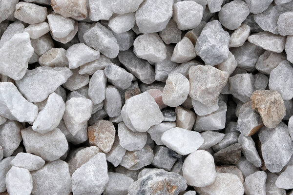 Декоративная каменная конструкция крошки крупным планом макро фото каменного дизайнера фона. Мраморные крошки. Пеббл