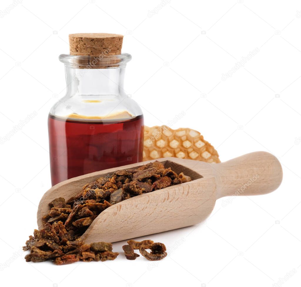 Propolis or bee glue with tincture. Isolated on white background. Apitherapy. How to treat bee propolis