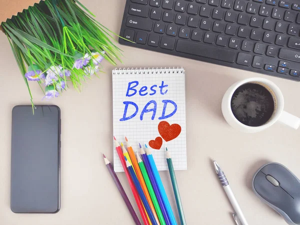 father\'s day. writing pad with text best papa and painted hearts. fathers day greeting card.