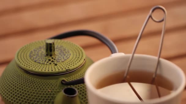 Herbal tea and teapot — Stock Video