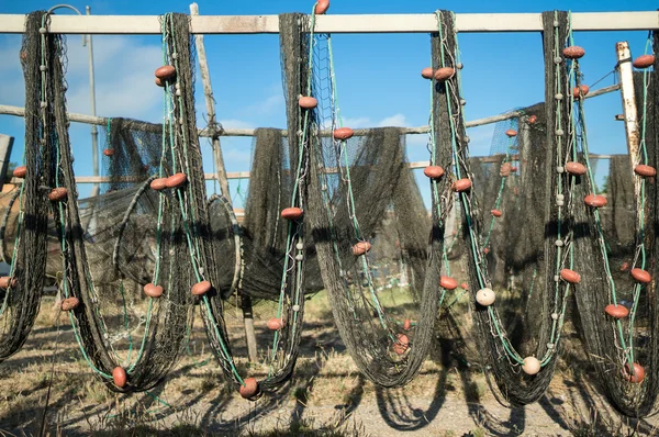 Fishing net drying in the sun — Stock Photo, Image