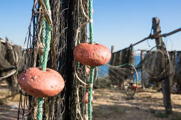 Fishing net drying in the sun — Stock Photo, Image