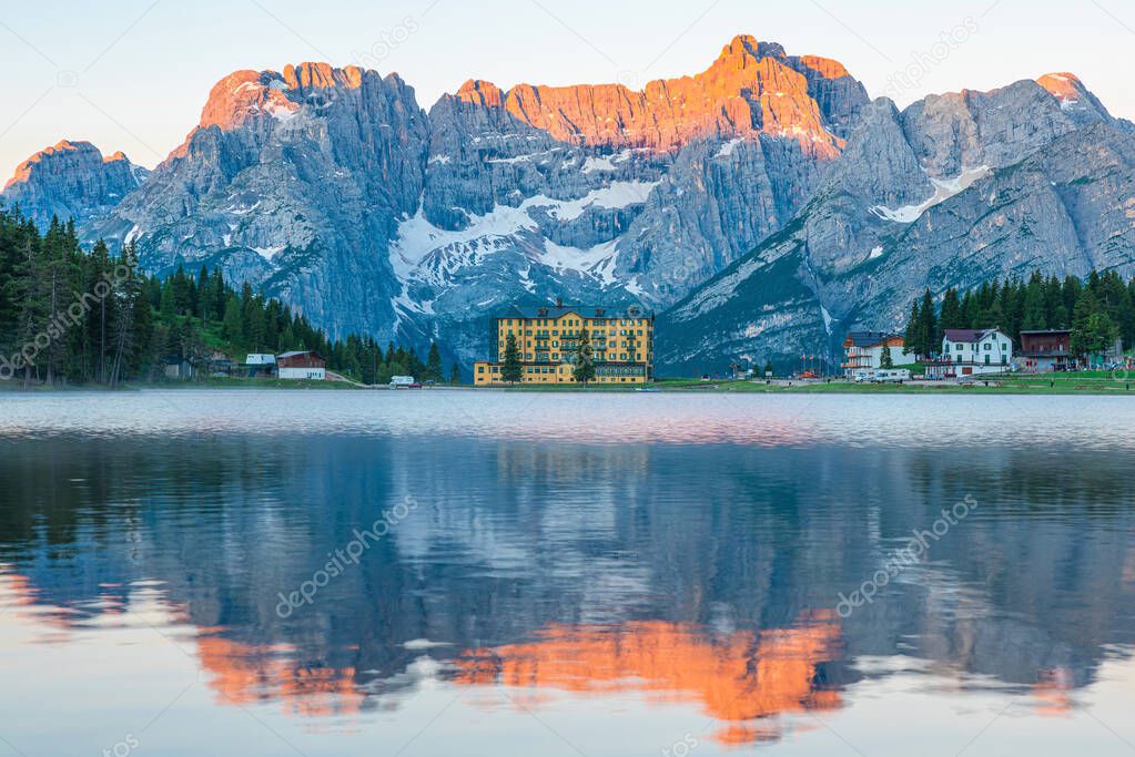 Sunrise at Misurina Lake in Dolomites mountains in Italy near Auronzo di Cadore with Sorapiss mountain in the background. South Tyrol, Dolomites