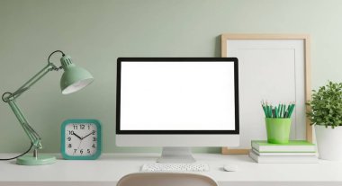 Tasarımlarınızı sergilemek için mükemmel, boş bir bilgisayar ekranı olan modern bir ofis. İçinde bir lamba, bir saat, bir bitki ve temiz beyaz bir masanın üzerindeki kitaplar var..