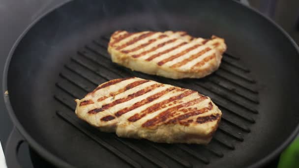 Chef is grilling a steak on the grill — Stock Video