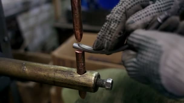 Work makes spot welding of two detail — Stock Video