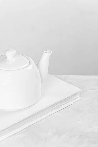 White Ceramic Kettle Stands White Book — Stock Photo, Image