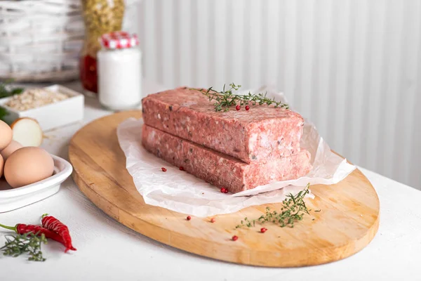 The stuffed mince of fish on the kitchen table — Stock Image The stuffed mince of fish on the kitchen table Stock Photo