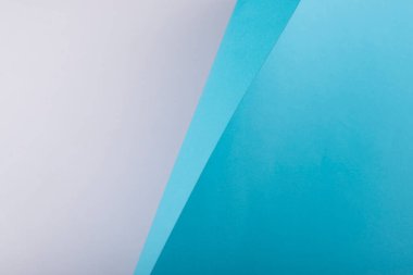 Açık mavi ve gri arkaplan. Kağıt arkaplan. Desenli yüzey.