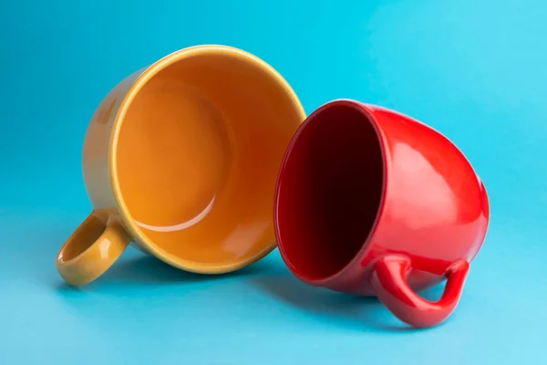 Yellow Red Empty Cup Tea Coffee Blue Background — Stock Photo, Image