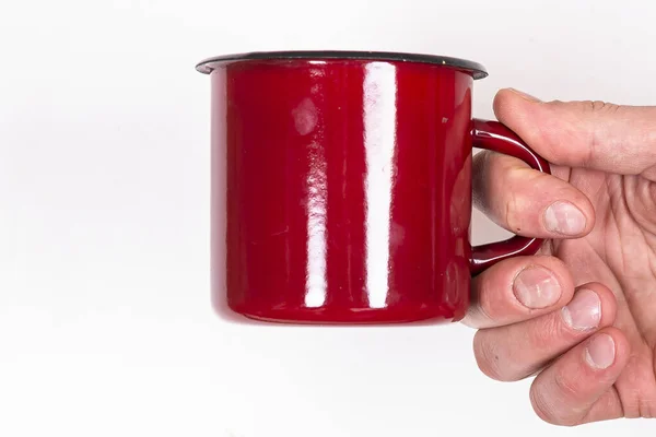 Man holding red mug isolated on white — Stock Photo, Image