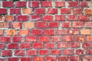 Detaylı kırmızı tuğlalı duvarın arka planında kopya alanı var. Kırmızı Tuğla Duvar. Eski tuğla duvar dokusunu kapatın. Kırmızı taşlar duvarı. Çimentolu mason. Tuğla Duvar Yaşlı Tuğla ve Havan duvarı.