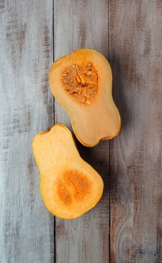 Big red pumpkin background, copy space, Orange  pumpkin , close-up.Pumpkin .Cooking seasonal food from pumpkin. Delicious healthy food. Organic.Autumn.Winter. Vitamins. Diet. Slimming. 