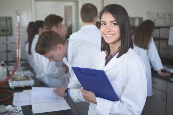 Happy student, content for experimental results. Pharmacy.Young medicine developer pharmaceutical researcher. —  Fotos de Stock