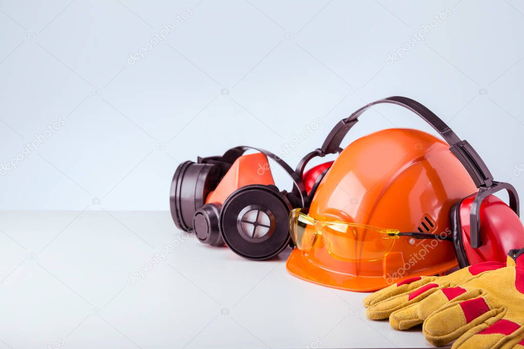 Personal protective equipment on white grey background with copy space.