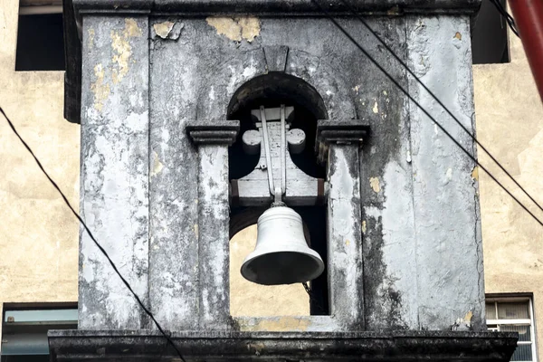 Bell in the bell tower of a historic chapel of the Catholic church in downtown Sao Paulo
