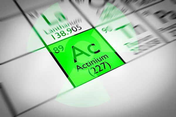 Yeşil radyoaktif aktinyum kimyasal element üzerinde odaklanmak — Stok fotoğraf