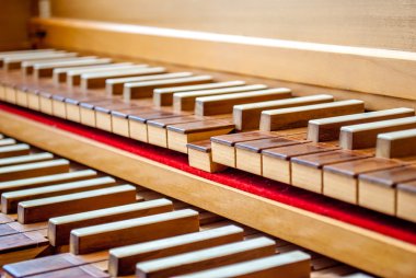 Harpsichord keyboard close-up view with a playing tone clipart