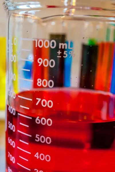 Chemical red beaker — Stock Photo, Image