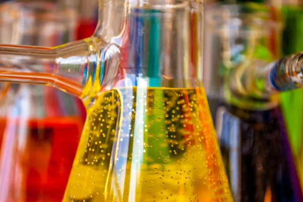 Chemistry yellow bubbles — Stock Photo, Image