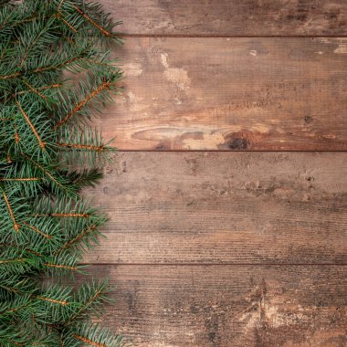 Köknar dalları olan köylü Noel arkaplanı. Noel arkaplanı köknar ağacı ve dekor. Kopyalama alanı olan üst görünüm. kış