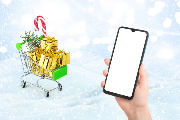 Bevásárlókosár Ajándékdobozokkal Okostelefon Mockup Karácsonyi Dekorációk Háttérben Karácsonyi Online Vásárlási — Stock Fotó