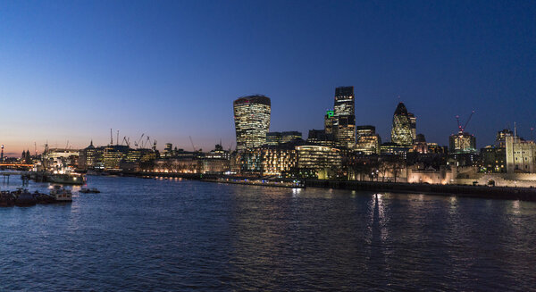 River Thames London by night with City of London skyline