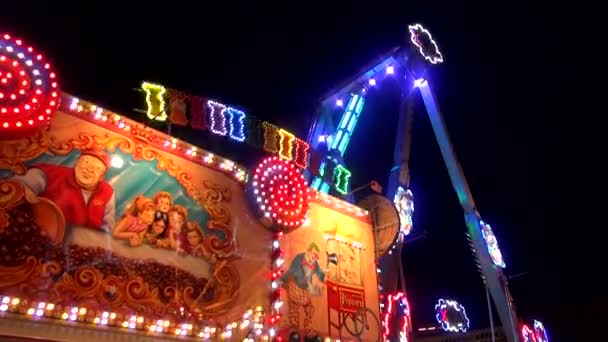 Octoberfest fun- amusement park in the evening — Stock Video