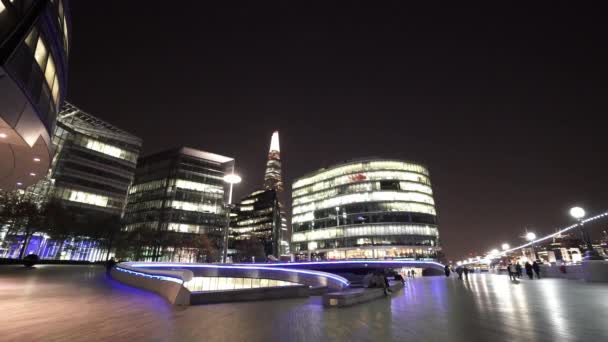 Amazing city lights of More London Riverside by night  - LONDON, ENGLAND — Stock Video