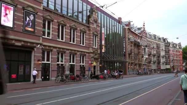 Tram driving through the city of Amsterdam — Stock Video