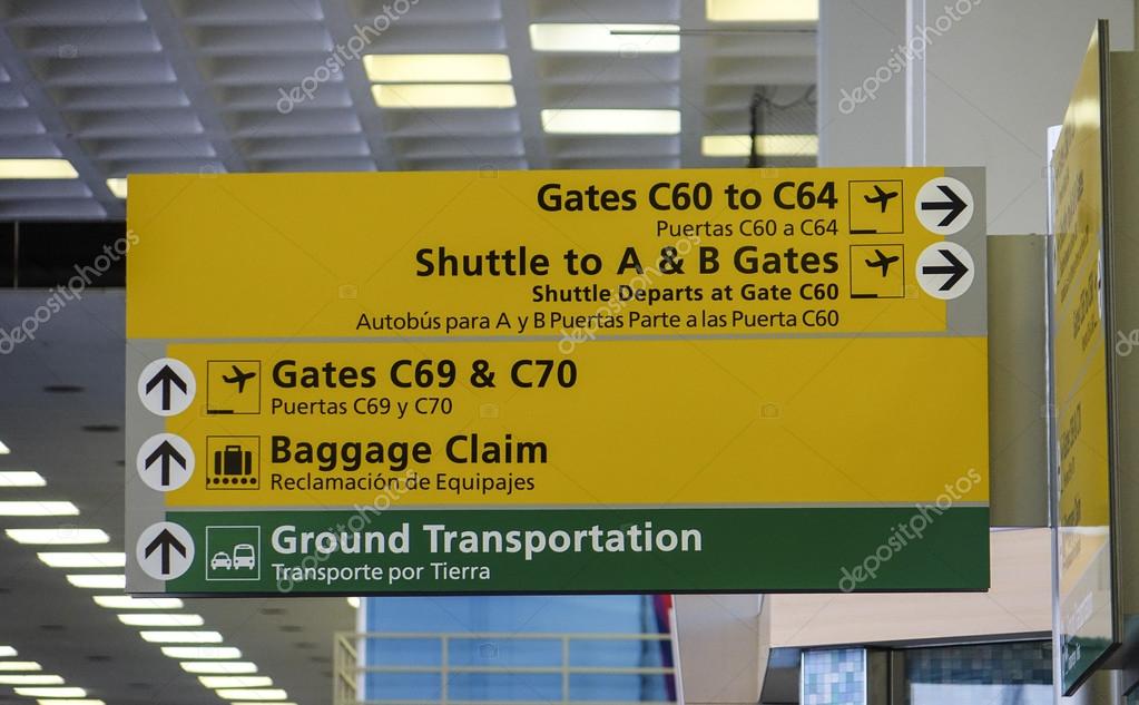 Direction signs at gate of JFK Airport New York NEW YORK, USA APRIL