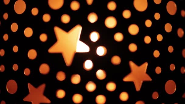 Рождественский фон со свечой и звездами — стоковое видео