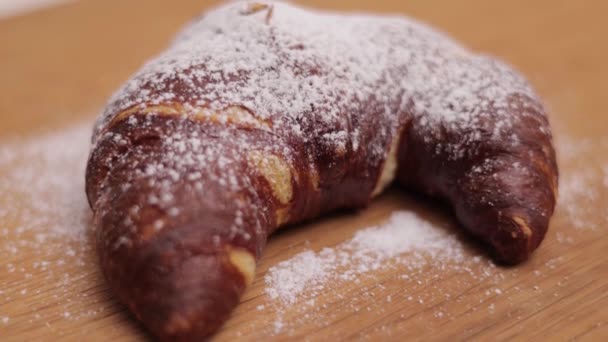 Sweet French croissant with sugar - freshly baked — Vídeos de Stock