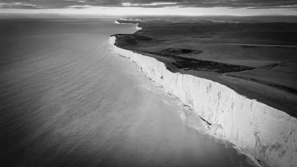Flight over the white cliffs of the English South coast in black and white
