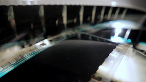 Close Up view of a 35mm film strip - macro shot — Stockvideo