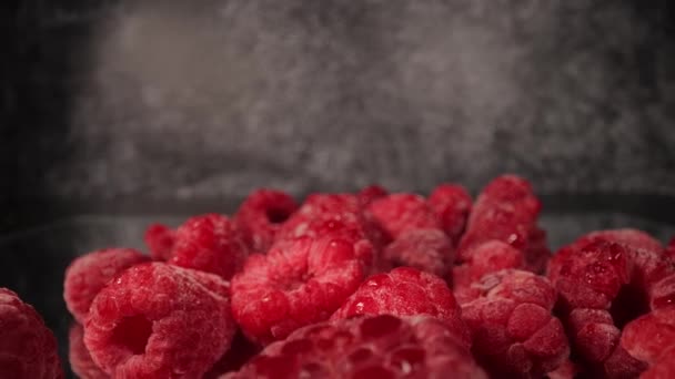 Frozen raspberries in close-up shot — Stock Video