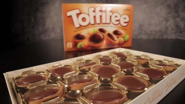 Toffifee - sweet caramel candy with chocolate - FRANKFURT, GERMANY - MARCH 4, 2021 — Stock Video