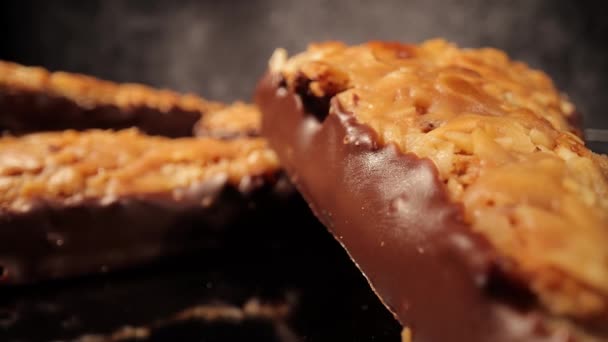 Close-up shot of nut triangles with almonds - a German specialty — Stock Video