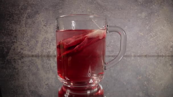 A glass of fruit tea in close-up view — Stock Video
