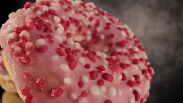 Sweet doughnuts in close-up view - macro shot — Stock Video