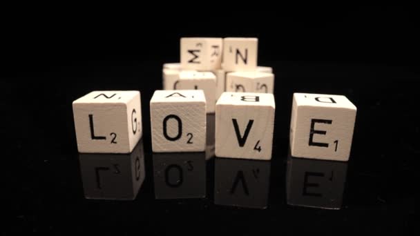 Letters on cubes write the word Love