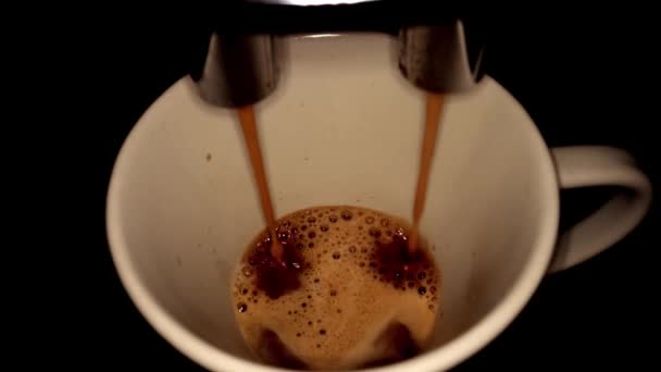 Coffee machinine prepares a cup of coffee - close-up view — Stock Video