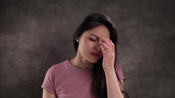 Young woman has terrible headache and pain — Stock Video