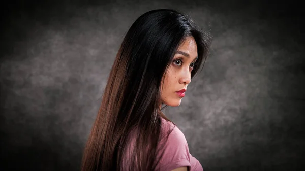 Young pretty woman in profile - portrait shot