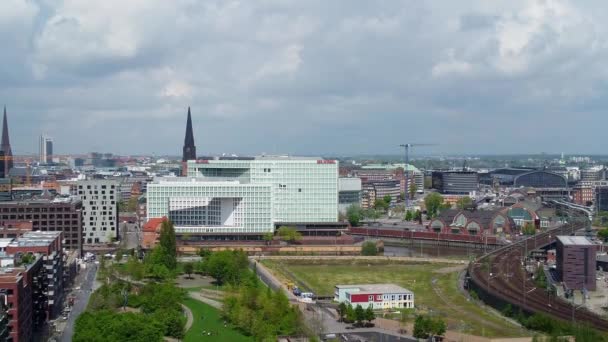 Aerial view over modern Harbour City district in Hamburg at the port - HAMBURG, GERMANY - MAY 10, 2021 — Stock Video