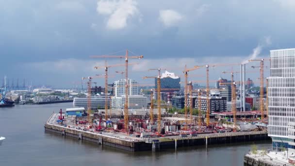Major construction sites in the modern and fast growing city of Hamburg - aerial view — Αρχείο Βίντεο