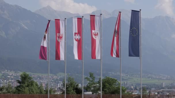 Flags on Bergisel in Innsbruck AUSTRIA, EUROPE - INNSBRUCK, AUSTRIA, EUROPE - JULY 29, 2021 — Stockvideo