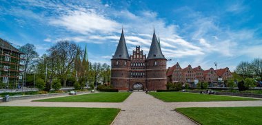 Famous Holsten Gate in the city of Lubeck Germany - LUBECK, GERMANY - MAY 10, 2021 clipart