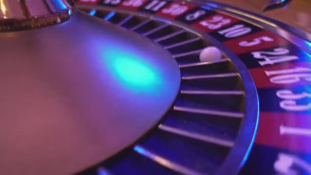 Roulette Wheel in a casino - close up view - ball on 5 red — Stock Video